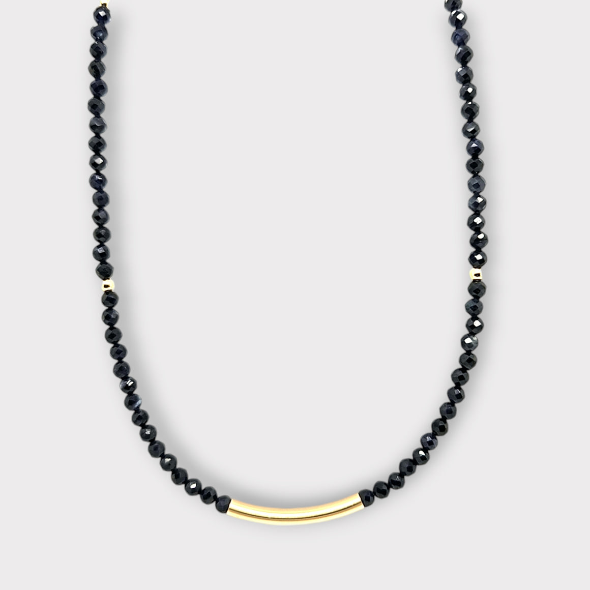 Faceted Dark Blue Sapphire Necklace with Gold Bar