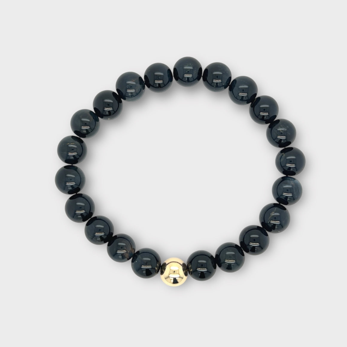 Dark Blue Hawks Eye Bracelet with Gold Ball